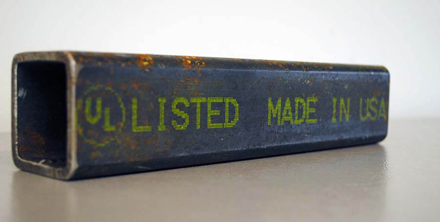 Metal pipe with pigmented ink using V-Series marking machine with large character human readable text
