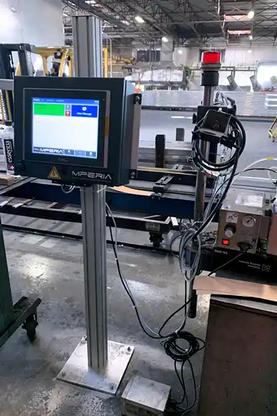 V-Series Drop-on-demand valvejet metal marking machine on a production line with MPERIA controller.