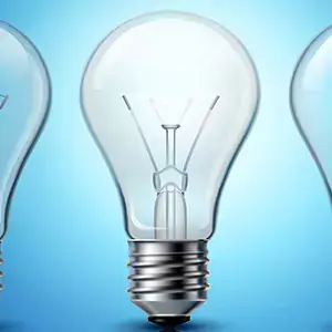 Single lightbulb on blue background