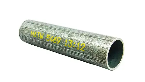 Metal pipe with yellow ink markings